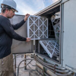Hvac,Mechanic,Doing,An,Air,Filter,Change,On,A,Commercial